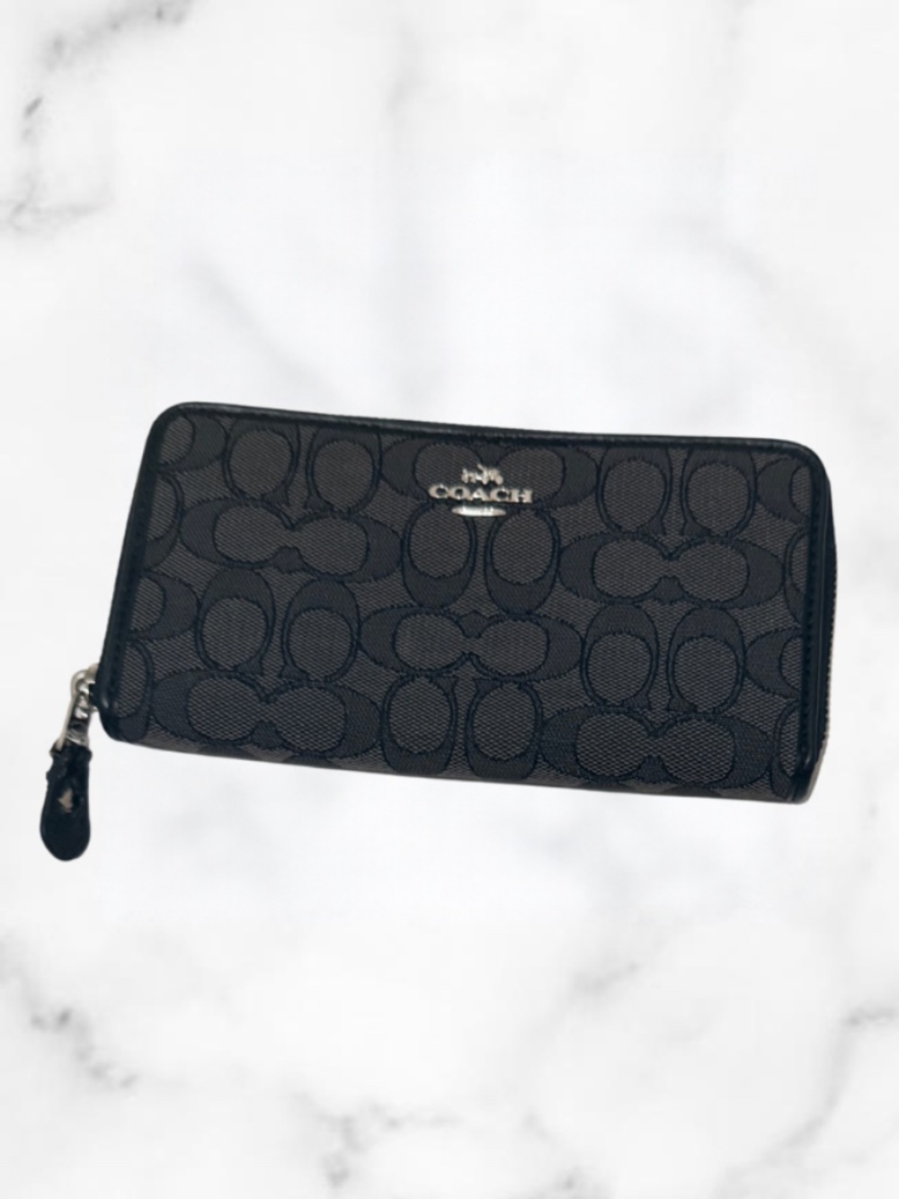 Coach Slim Accordion Zip Wallet Zipper has been chewed by a dog (see photo)